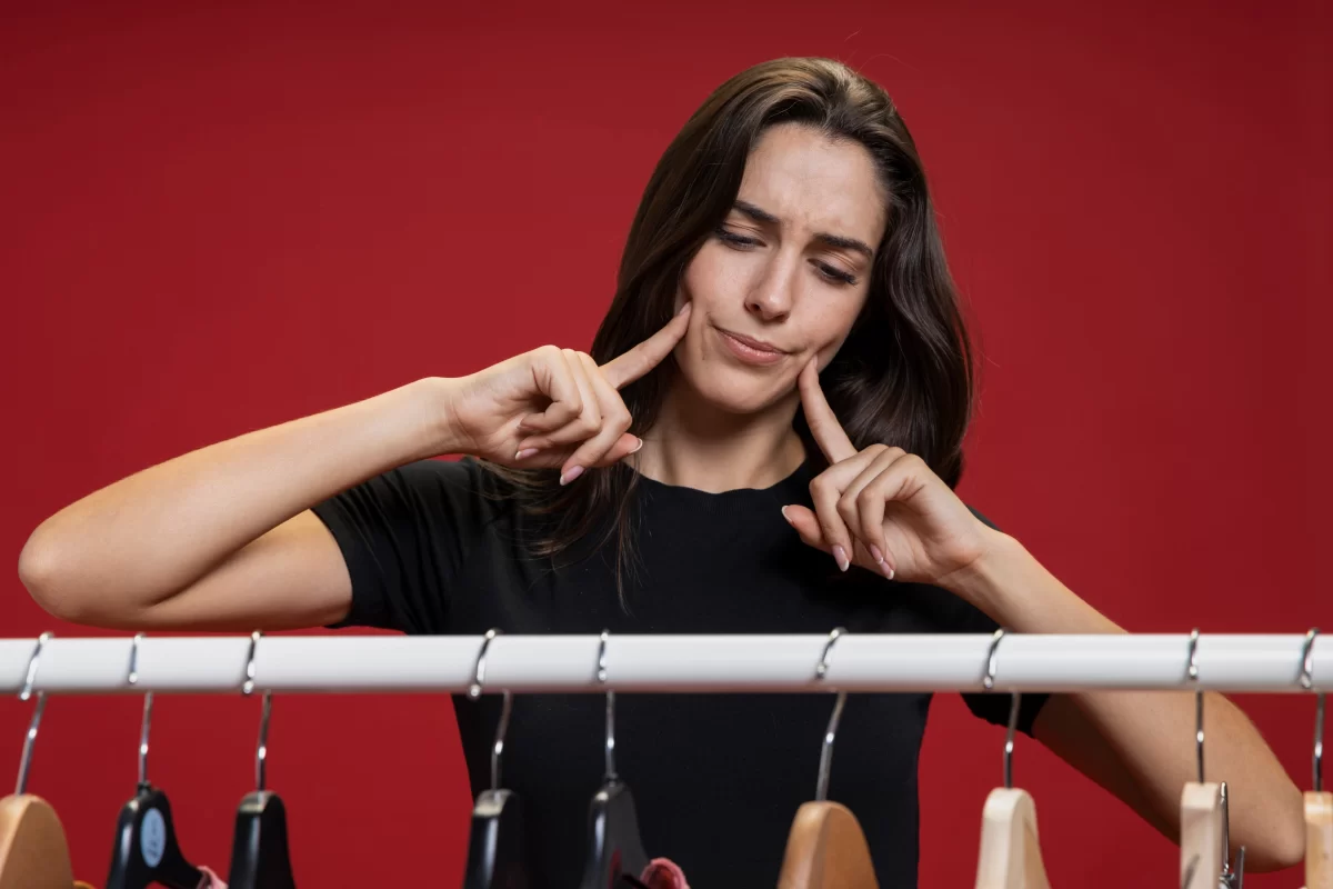 women looking at clothes
